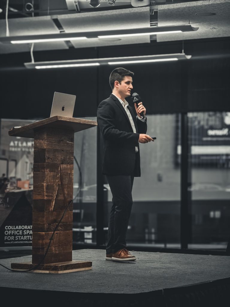 Presenting Case Nurse on stage at Atlanta Tech Village